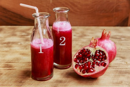 Fresh pomegranate juice in a bottle